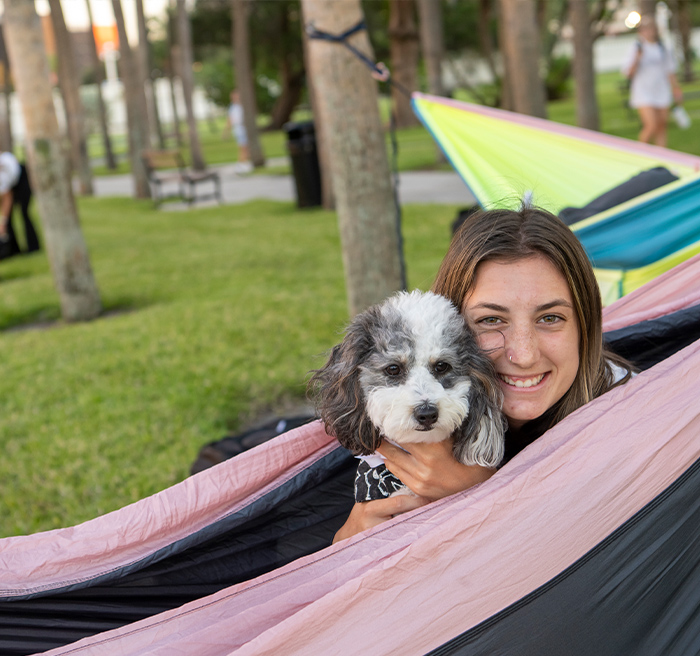 Student and Dog Enjoy Plant Park 