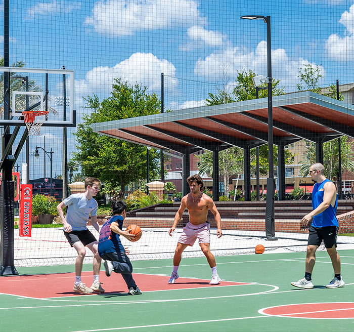 Students Playing Basketball in their spare time 