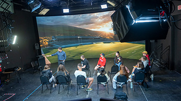 Students on virtual reality film set.