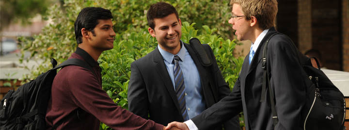 Students shaking hands