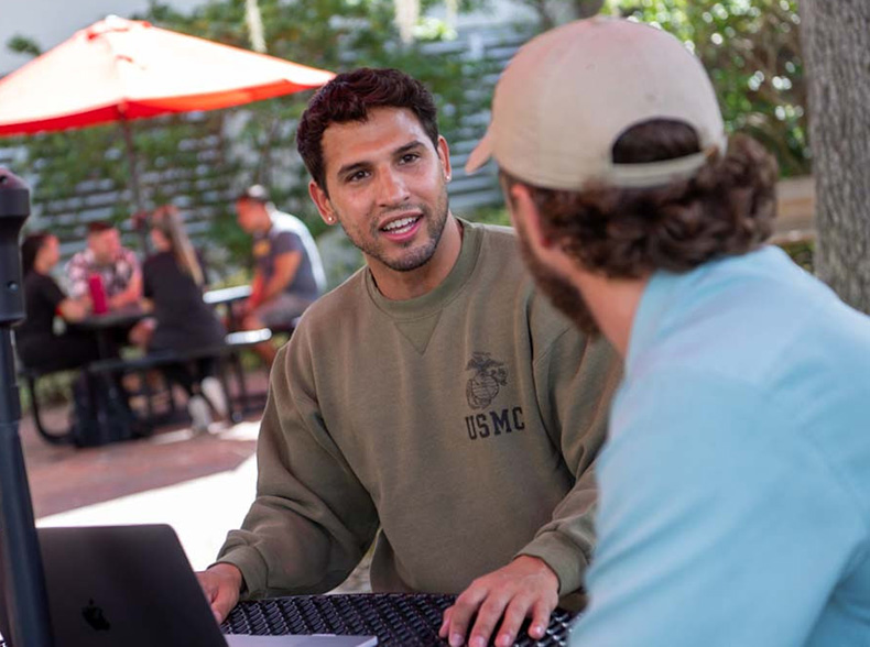 Transfer students talking at lunch