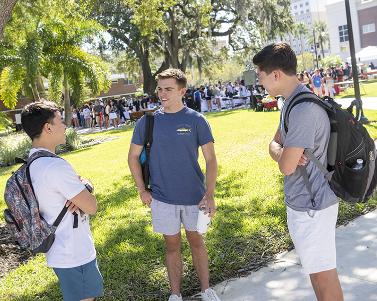 3 students talking