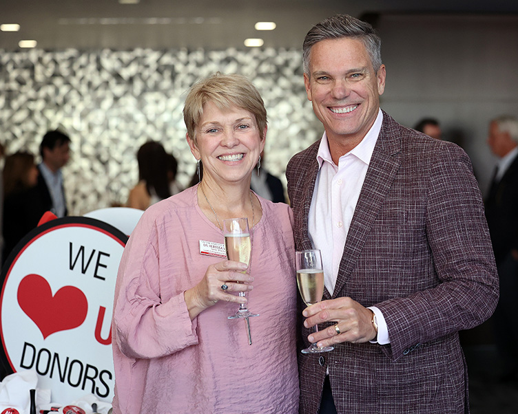 Board of Fellows members at a Give Day event