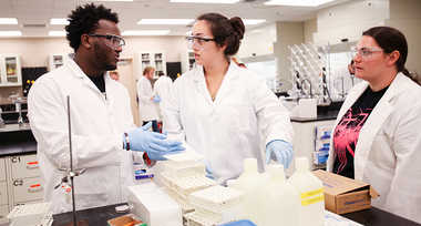 Students in a science lab doing an experiment