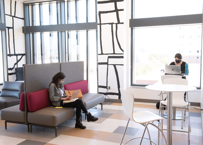 Students sitting in a study lounge