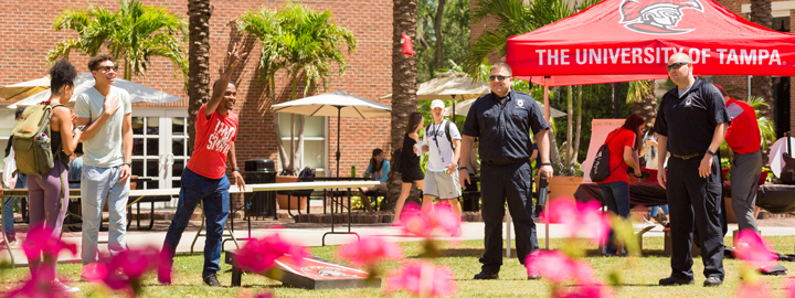 People playing Cornhole 