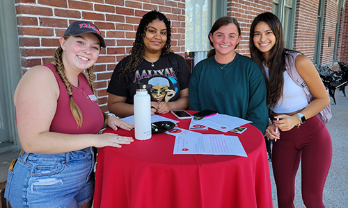 Students on Plant Hall Verandah