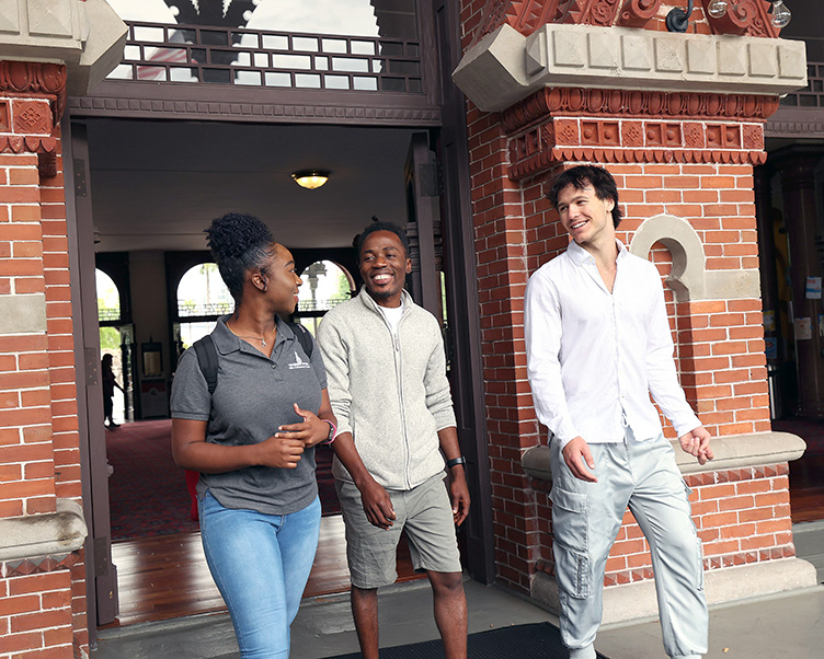 Student walking on campus.