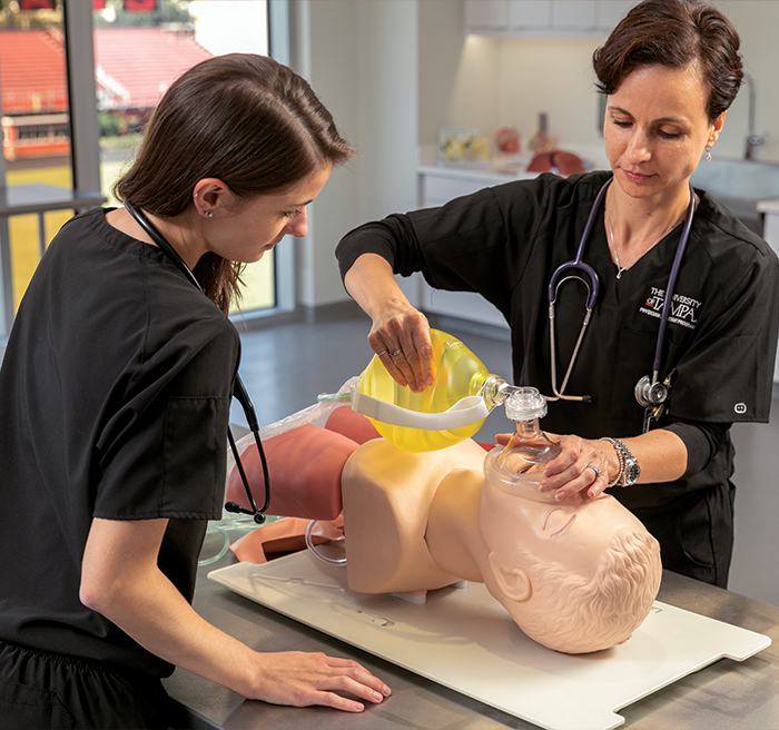 People practicing CPR